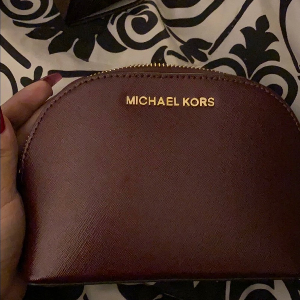 Michael Kors cosmetic bag.